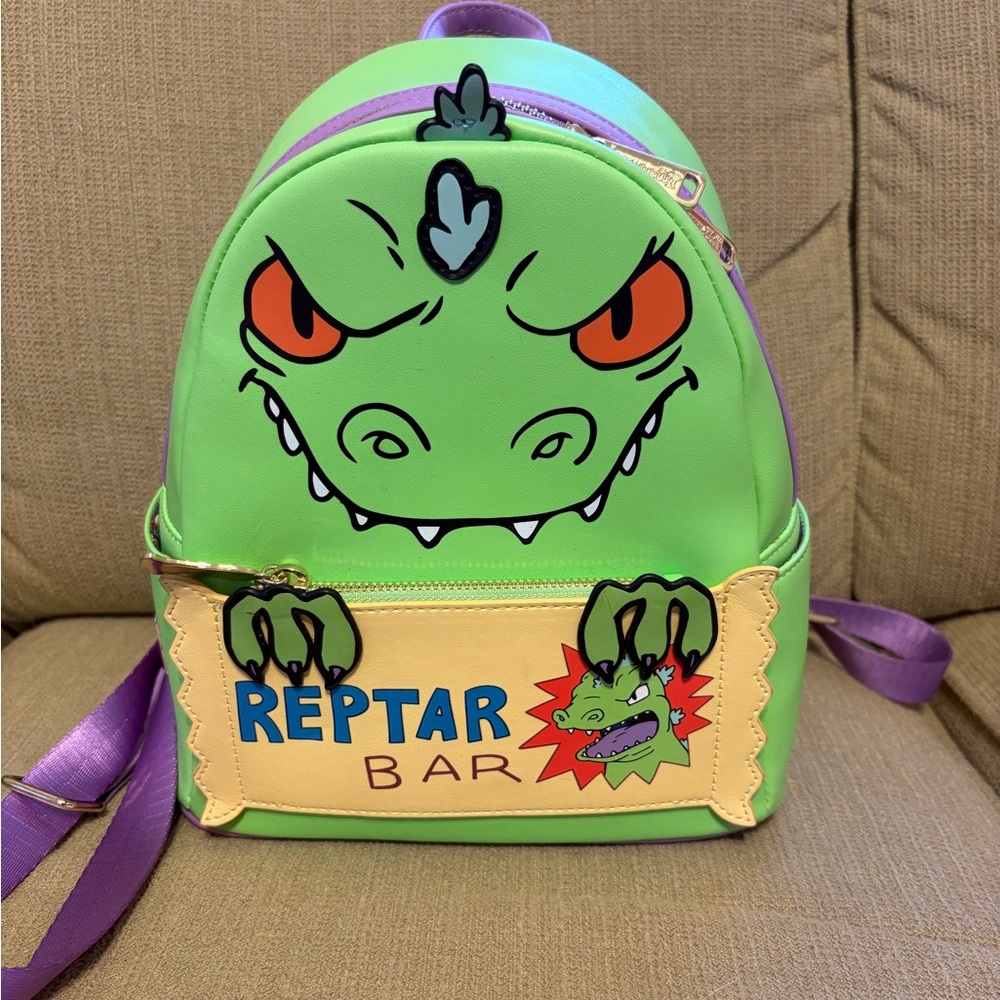 Loungefly Green and Purple Reptar Backpack